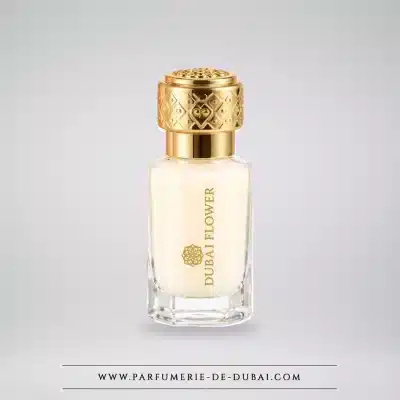 Piżmo Tahara Baby Musk Dubaï Flower 12 ml w przezroczystym szklanym flakonie ze złotą nakrętką.