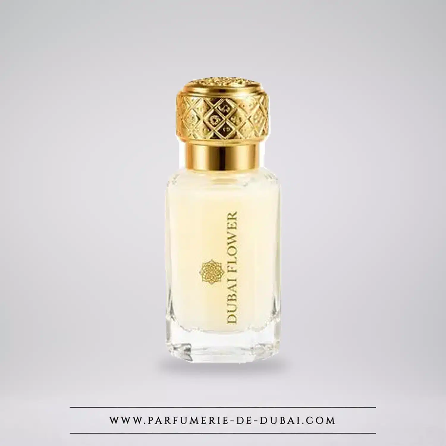 Piżmo Tahara Bella Dubaï Flower 12 ml w przezroczystym szklanym flakonie ze złotą nakrętką.