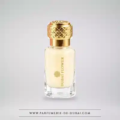 Piżmo Tahara Bonbon Dubaï Flower 12 ml w przezroczystym szklanym flakonie ze złotą nakrętką.