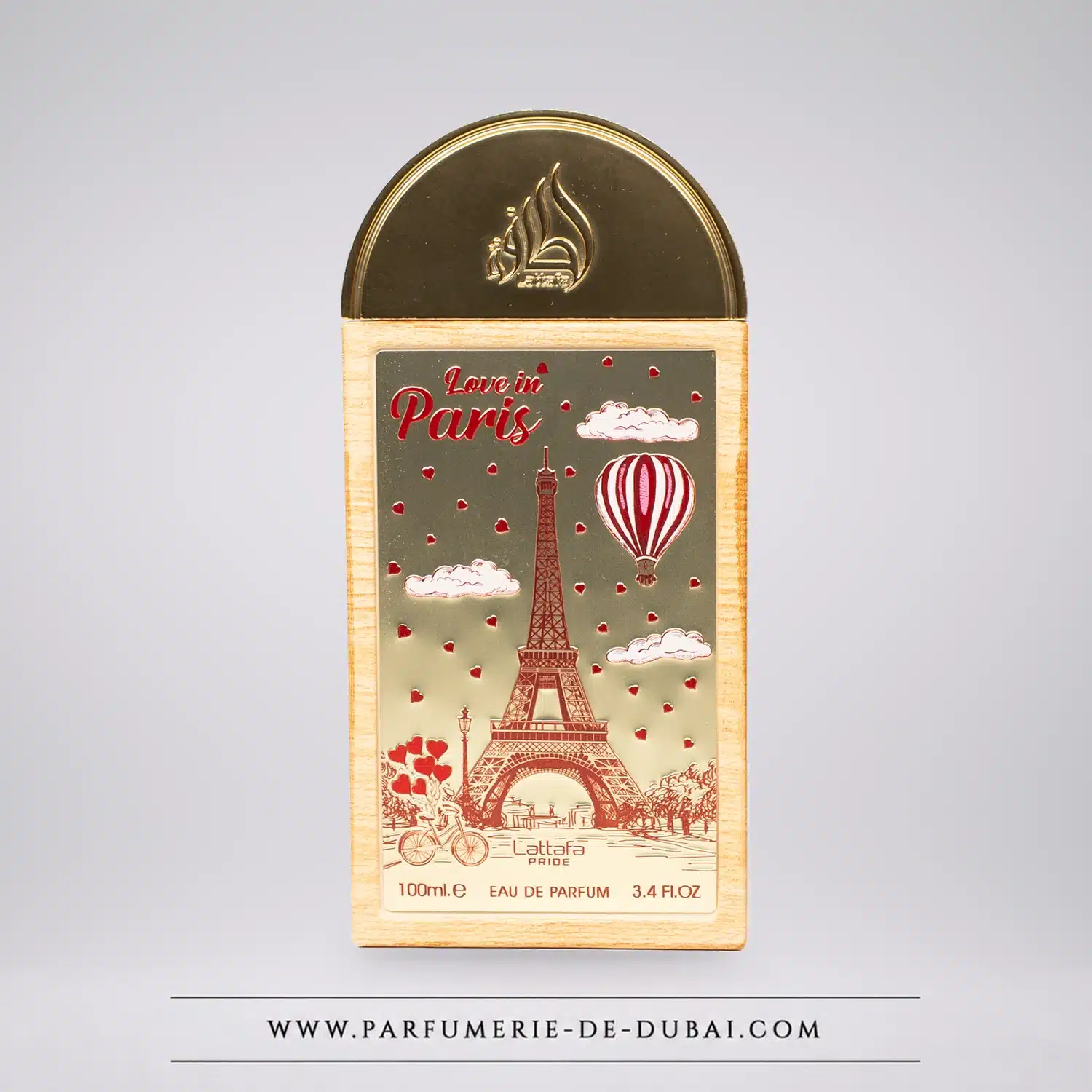 Flakon perfum Love in Paris marki Lattafa Pride, 100 ml, z motywem wieży Eiffla.